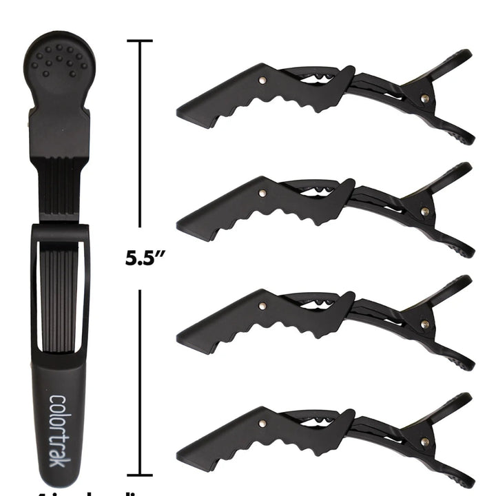 Black hair clip set with four jumbo clips and a measuring scale on a white background