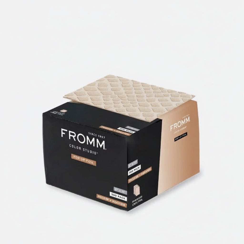 Box of FROMM color swatches with a textured beige sample on a light gray background