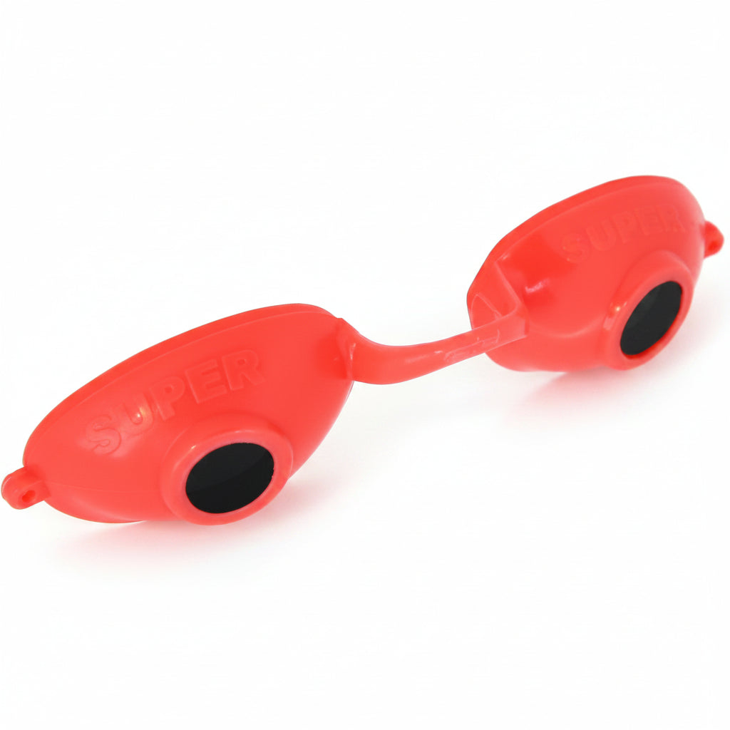 Red silicone eye mask on a white background